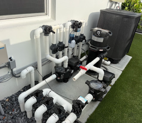 Pool equipment pad with variable speed pump, filter tank and valves installed by Swimfinity Elite